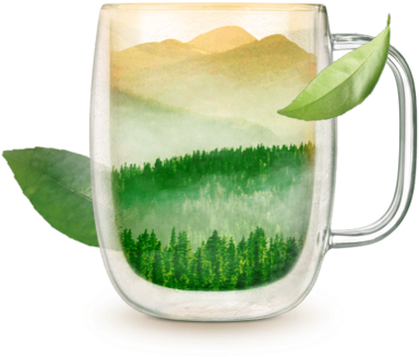 Glass mug with green mountainous landscape inside it.